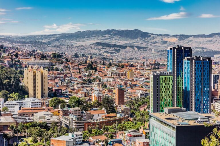 Bogota city skyline with mountains in the background.