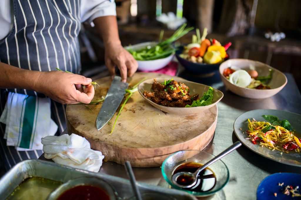 A person preparing Cambodian food.