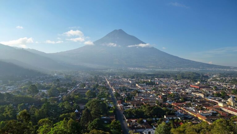 The view of the volcano and town from Cerro De La Cruz viewpoint in Antigua, Guatemala.