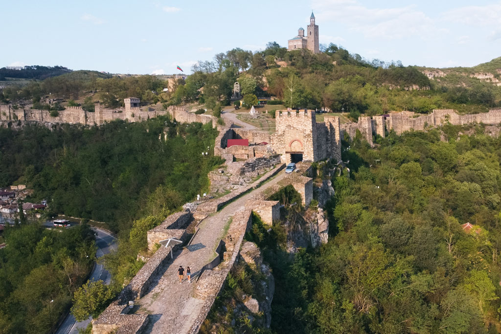 The Tsarevets Fortress in Veliko Tarnovo surrounded by trees.