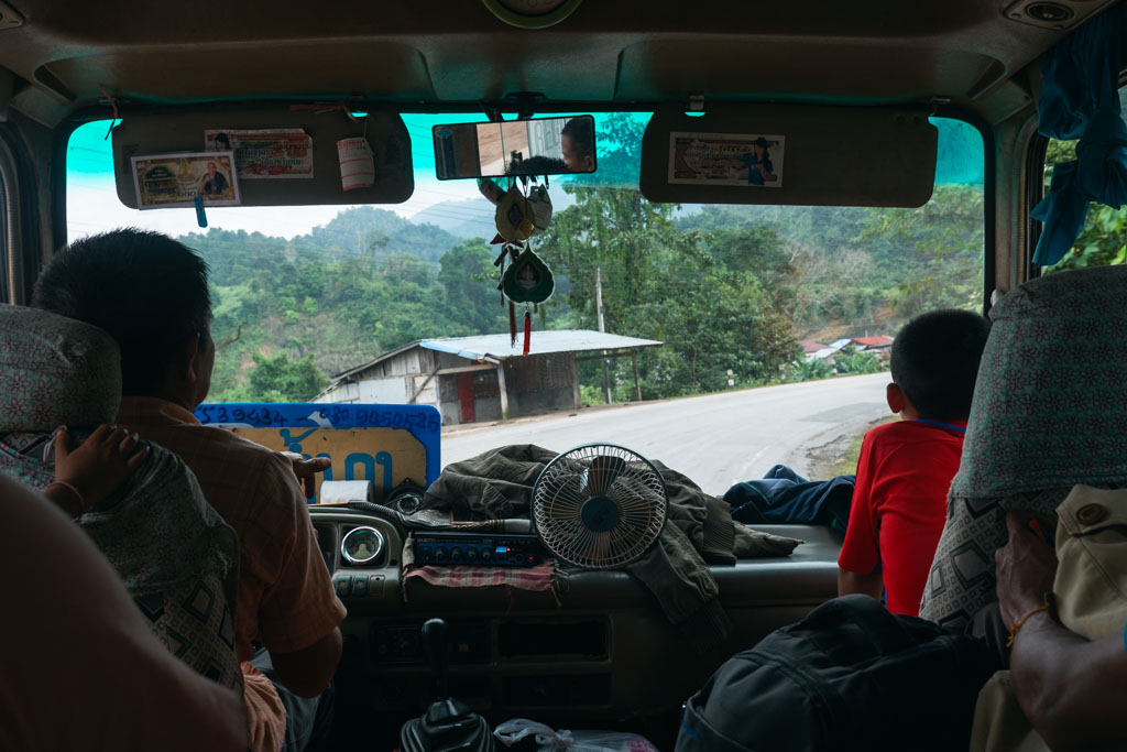 People inside a minibus in Laos.