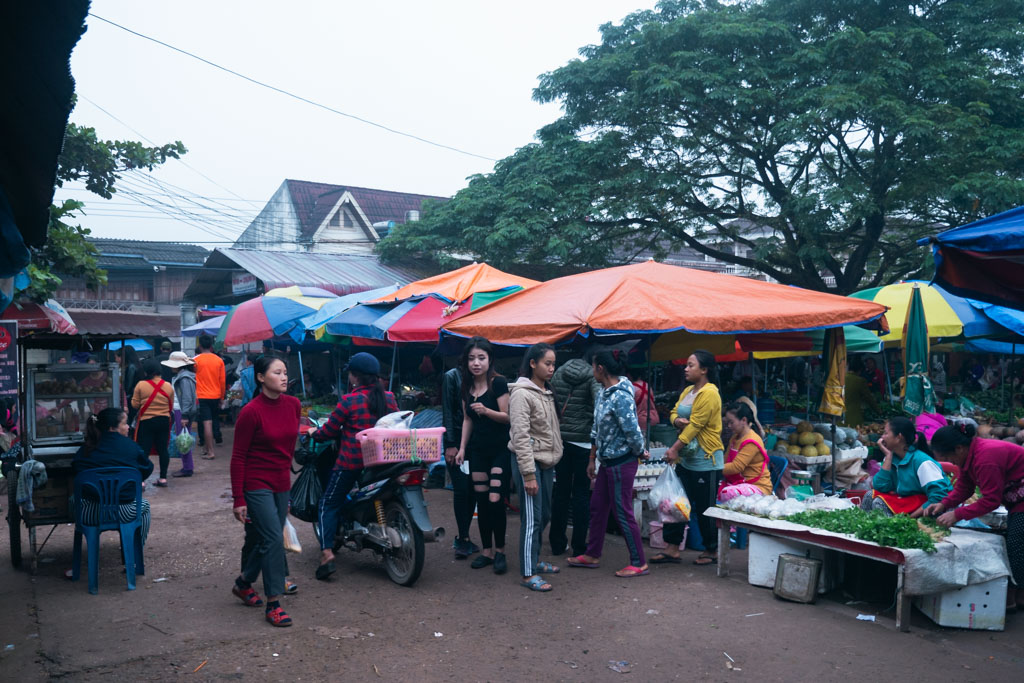 People at a market in Luang Namtha, Laos.