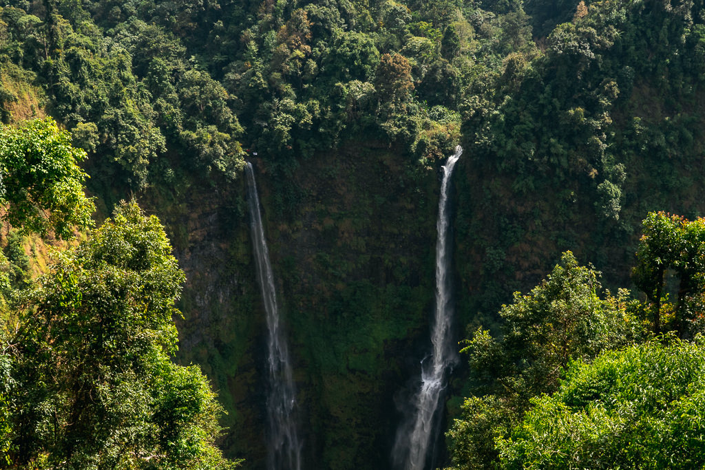 Two waterfalls in a mountain in Laos.