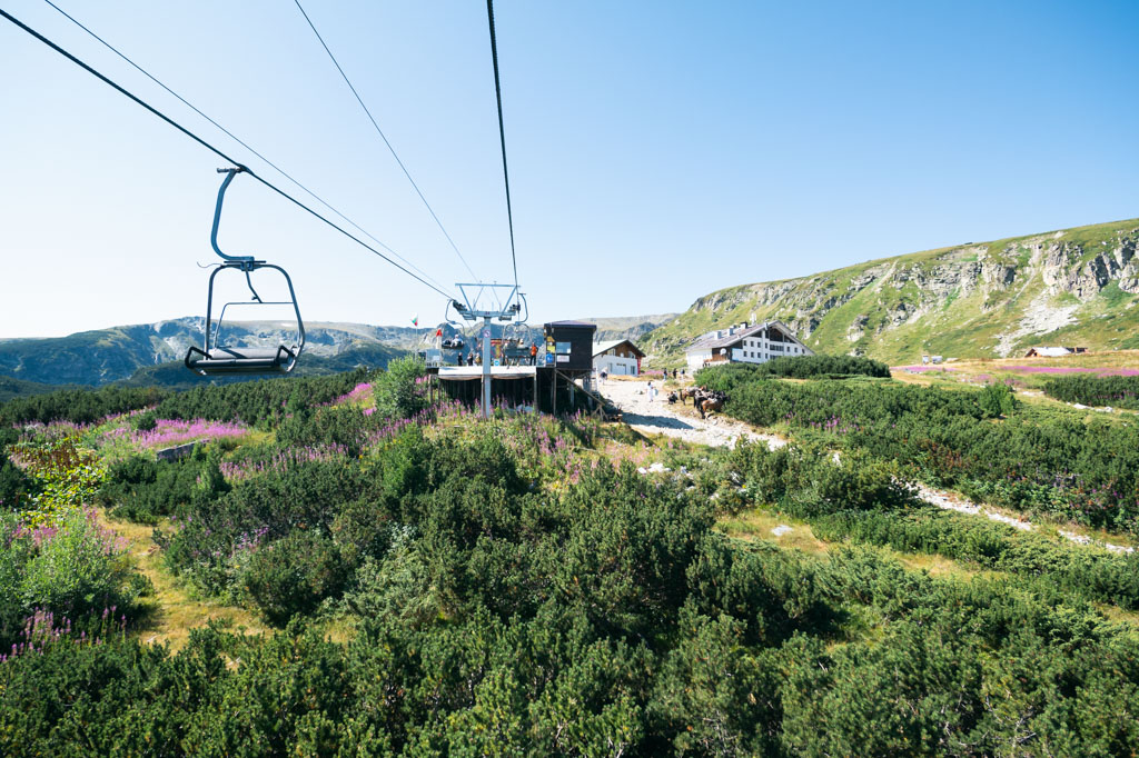 Ski lift above greenery at Seven Rila Lakes hike.