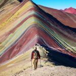 A person hiking the Rainbow Mountain in Peru