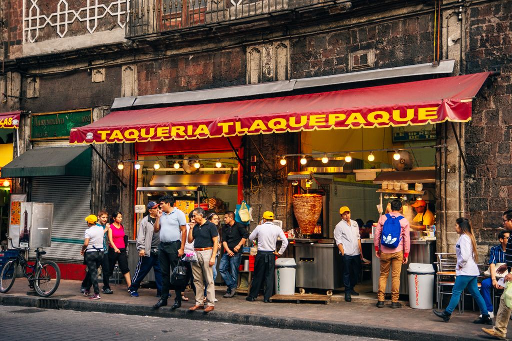 The storefront of a taqueria in Mexico City.