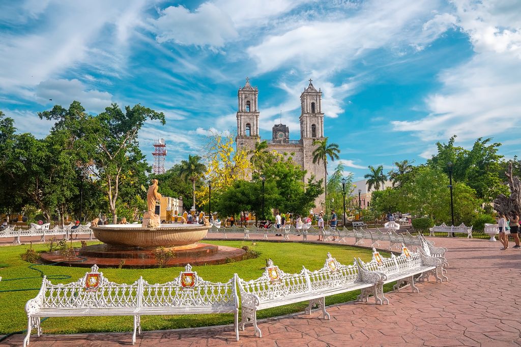 A fountain area in Valladolid with the church at the background