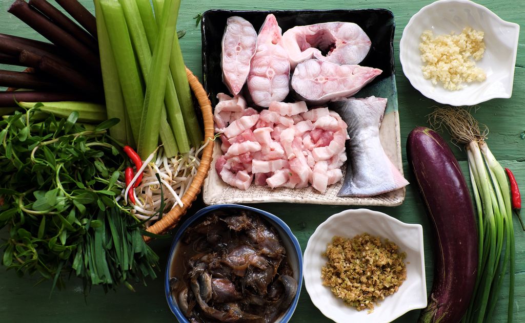 Ingredients of a Vietnamese food set on a table.